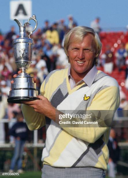 Greg Norman of Australia holds the Claret Jug after winning his first major title during the final round of the 115th Open Championship held on 20th...