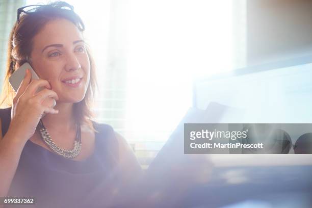 businesswoman on the phone - managing director office stock pictures, royalty-free photos & images