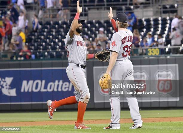 Boston Red Sox right fielder Chris Young and Boston Red Sox Josh Rutledge celebrate a victory after a MLB game between the Boston Red Sox and the...