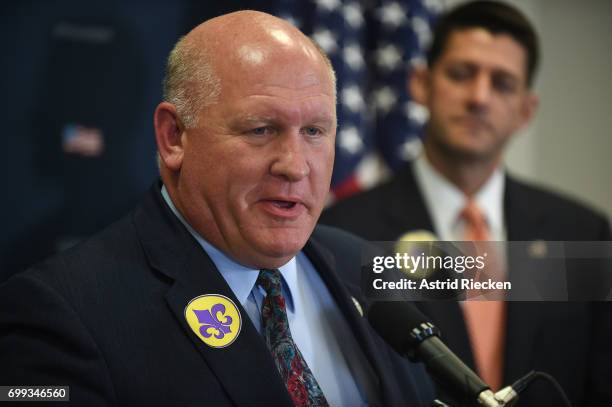 Rep. Glenn Thompson is watched by U.S. Speaker of the House Rep. Paul Ryan while speaking to the media on Capitol Hill after their weekly party...