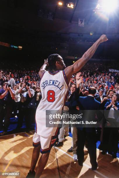 Latrell Sprewell of the New York Knicks celebrates with the crowd after winning the 1999 NBA Eastern Conference Finals against the Indiana Pacers at...
