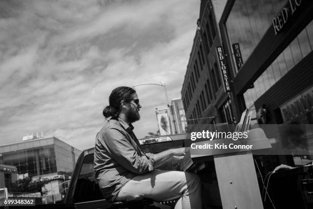 Darren Denman performs during the "Ella Fitzgerald Piano Bar Throughout Historic Harlem" as part of Make Music Day New York at the Apollo Theater on...