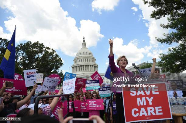 Sen. Elizabeth Warren speaks at a rally to oppose the repeal of the Affordable Care Act and its replacement on Capitol Hill on June 21, 2017 in...