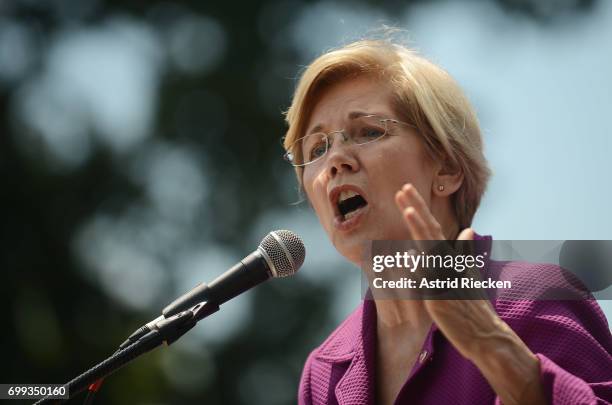 Sen. Elizabeth Warren speaks at a rally to oppose the repeal of the Affordable Care Act and its replacement on Capitol Hill on June 21, 2017 in...