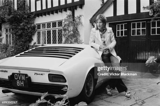 British rock singer Rod Stewart with his Lamborghini Miura, UK, 12th September 1971.