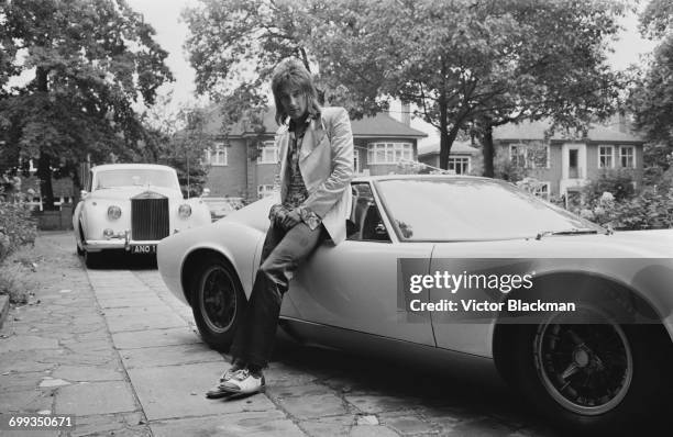 British rock singer Rod Stewart with his Lamborghini Miura, UK, 12th September 1971.
