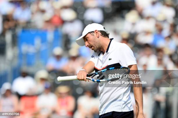 Julien Benneteau of France during the 2nd round match against Grigor Dimitrov of Bulgaria on day three at Queens Club on June 21, 2017 in London,...