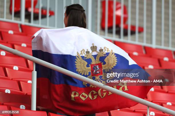 Russia fan holds a flag during the FIFA Confederations Cup Russia 2017 Group A match between Russia and Portugal at Spartak Stadium on June 21, 2017...