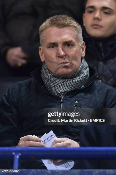 Brentford's newly appointed manager Dean Smith watches the game from the stands.