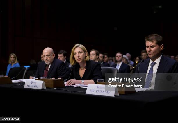 Jeanette Manfra, acting director of undersecretary, national protection and programs directorate at the Department of Homeland Security , center,...