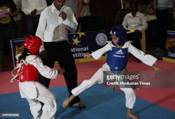 Suhana, daughter of actor Shah Rukh Khan displays tactics of Taekwondo at the National Tekwondo competition 2010 sponsored by Kolkata Knight Riders....
