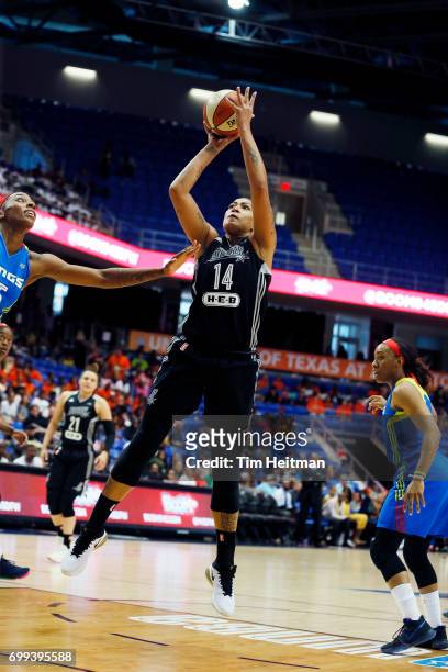 Erika de Souza of the San Antonio Stars shoots the ball against the Dallas Wings on June 21, 2017 at College Park Center in Arlington, Texas. NOTE TO...