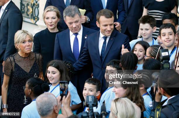 French President Emmanuel Macron and his wife Brigitte Trogneux, Colombian President, Juan Manuel Santos and his wife Maria Clemencia Rodriguez de...