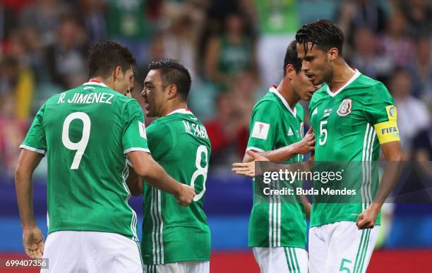 Raul Jimenez of Mexico celebrates scoring his sides first goal with Diego Reyes of Mexico during the FIFA Confederations Cup Russia 2017 Group A...