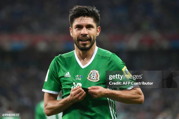 Mexico's forward Oribe Peralta celebrates after scoring a goal during the 2017 Confederations Cup group A football match between Mexico and New...