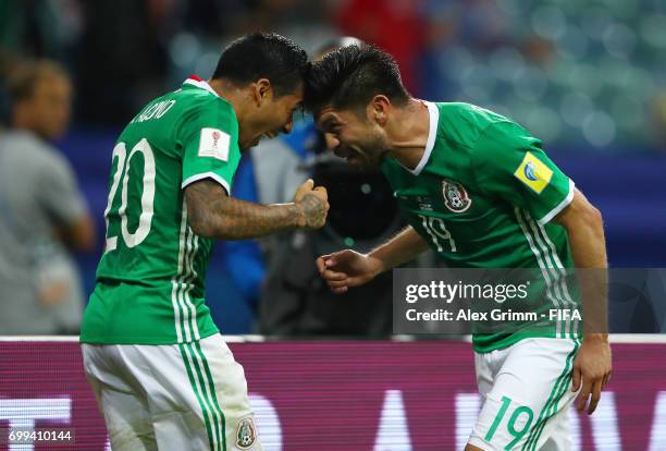 Oribe Peralta of Mexico celebrates scoring his sides second goal with Javier Aquino of Mexico during the FIFA Confederations Cup Russia 2017 Group A...