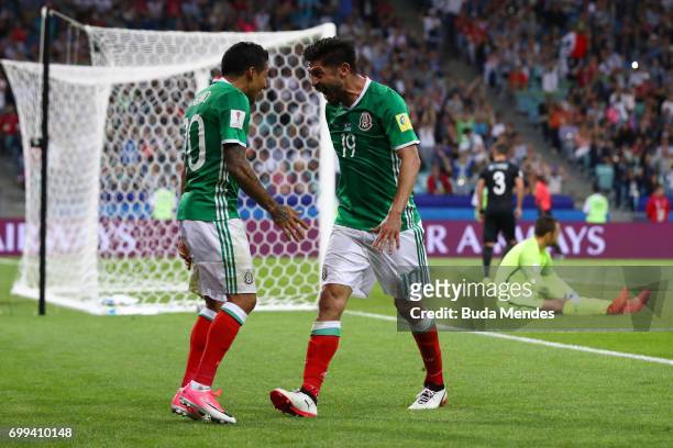 Oribe Peralta of Mexico celebrates scoring his sides second goal with Javier Aquino of Mexico during the FIFA Confederations Cup Russia 2017 Group A...
