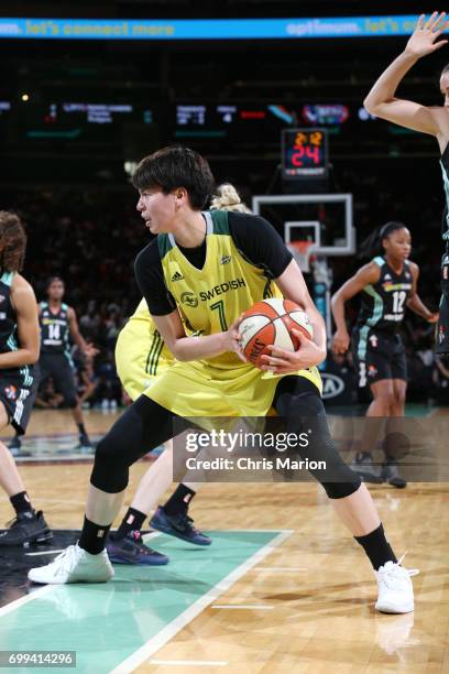 Ramu Tokashiki of the Seattle Storm handles the ball against the New York Liberty on June 11, 2017 at Madison Square Garden in New York, New York....