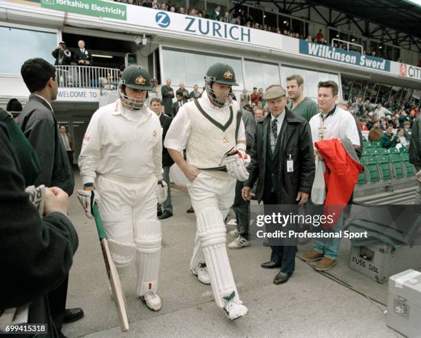 Australia's opening batsmen Mark Taylor and Mark Waugh walk out to open the batting during the 1st Texaco Trophy One Day International between...