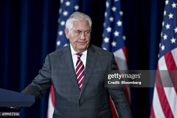 Rex Tillerson, U.S. Secretary of State, exits after a news conference following the inaugural U.S.-China Diplomatic and Security Dialogue meeting...