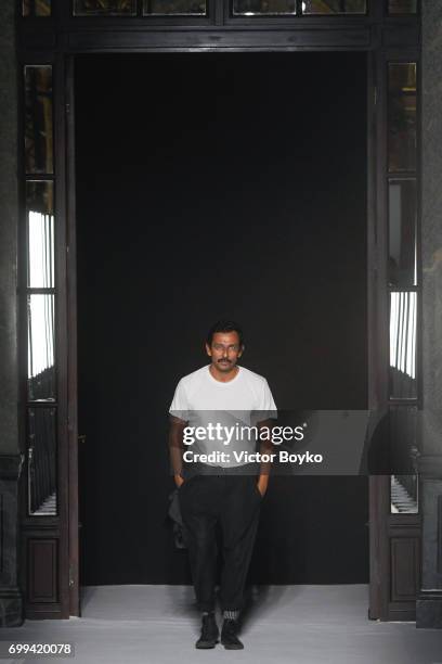 Haider Ackermann walks the runway during the Haider Ackermann Menswear Spring/Summer 2018 show as part of Paris Fashion Week on June 21, 2017 in...