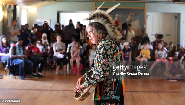 Elder Garry Sault tells stories in the Blue Barracks. National Aboriginal Day and Indigenous Arts Festival at Fort York in Toronto. The festival...