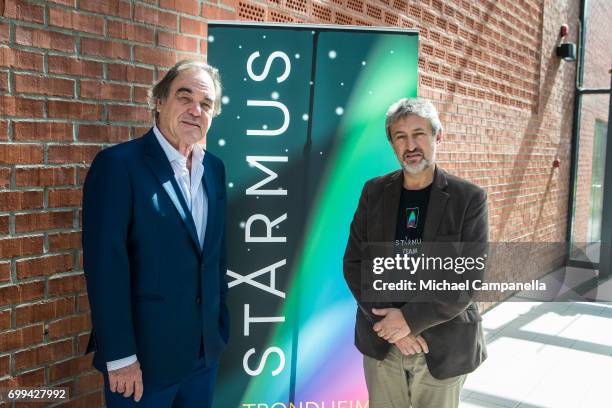 Oliver Stone and Garik Israelian pose for a picture during the Starmus Festival on June 21, 2017 in Trondheim, Norway.