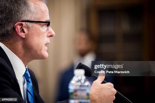 Acting FBI Director Andrew McCabe testifies before a House Appropriations subcommittee meeting on the FBI's budget requests for FY2018 on June 21,...