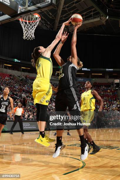 Erika de Souza of the San Antonio Stars goes to the basket against the Seattle Storm on June 18, 2017 at KeyArena in Seattle, Washington. NOTE TO...