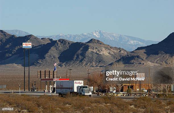 Truck travels through he tiny community of Amargosa Valley February 7, 2002 which is the gateway to the proposed nuclear waste dump site of Yucca...