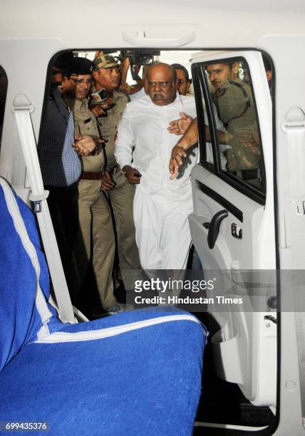 Former Calcutta High Court judge CS Karnan brought back by CID team on way to Presidency Jail on June 21, 2017 in Kolkata, India. He had been evading...