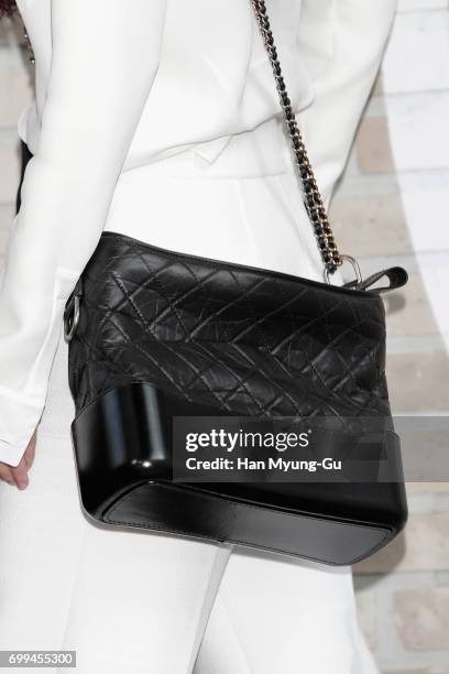 South Korean actress Jung Ryeo-Won , bag detail, attends the "Mademoiselle Prive" exhibition at the D-Museum on June 21, 2017 in Seoul, South Korea