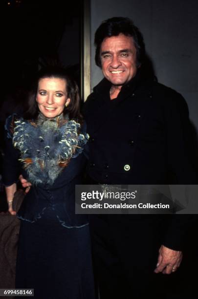 Husband and wife musicians Johnny Cash and June Carter Cash attends an event in May 1980 in Los Angeles, California.