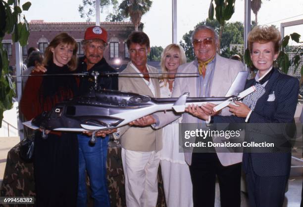 Jean Bruce Scott, Alex Cord, Jan-Michael Vincent, Catherine Hickland, Ernest Borgnine with his wife, Tova Borgnine "Airwolf" poses for a portrait...