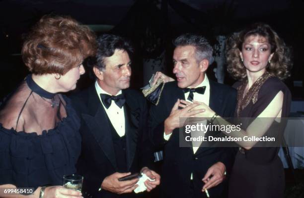 Actor Peter Falk and film maker John Cassavetes attends an event with Shera Danese in November 1981 in Los Angeles, California.