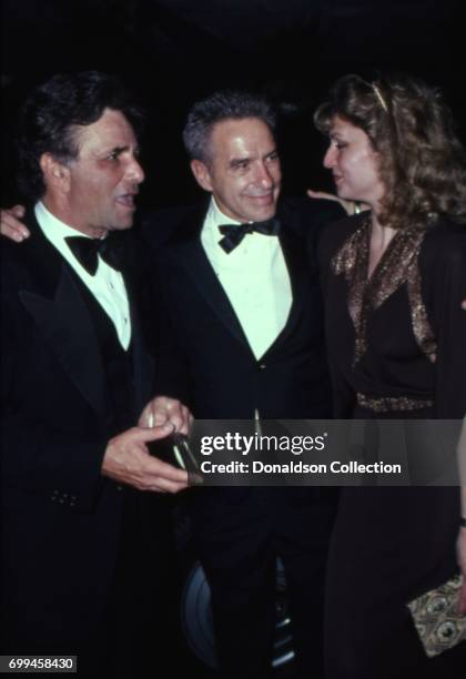 Actor Peter Falk and film maker John Cassavetes attends an event with Shera Danese in November 1981 in Los Angeles, California.