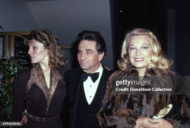 Actors Shera Danese, Peter Falk and Gena Rowlands attends an event in November 1981 in Los Angeles, California.