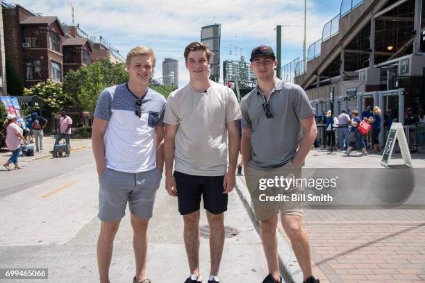 Casey Mittelstadt, Nolan Patrick, and Gabriel Vilardi outside of the field before the game between the Chicago Cubs and the San Diego Padres during...