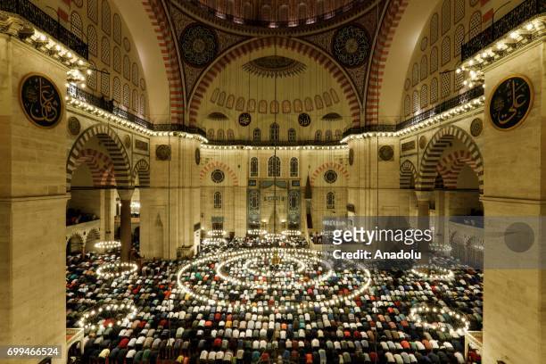 Muslims attend the mass prayer at the historical Sultan Ahmed Mosque, known as Blue Mosque, to mark Laylat al-Qadr, holiest of the Muslims' five holy...