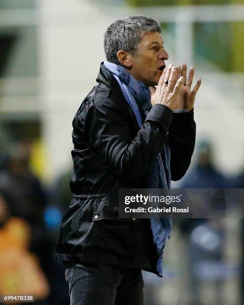 Mario Sciacqua coach of Olimpo gives instructions to his players during a match between Olimpo and Boca Juniors as part of Torneo Primera Division...