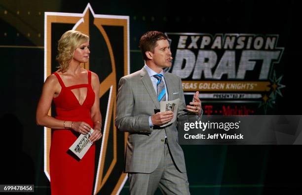 Hosts Kathryn Tappen and Daren Millard speak onstage during the 2017 NHL Awards & Expansion Draft at T-Mobile Arena on June 21, 2017 in Las Vegas,...