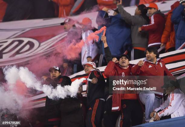 Fans of River Plate cheer for their team during a match between River Plate and Aldosivi as part of Torneo Primera Division 2016/17 at Monumental...