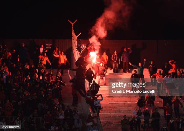 Fans of River Plate light flares to cheer their team during a match between River Plate and Aldosivi as part of Torneo Primera Division 2016/17 at...