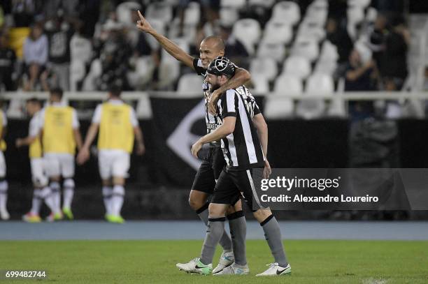 Roger of Botafogo celebrates a second scored goal with JoÃ£o Paulo during the match between Botafogo and Vasco as part of Brasileirao Series A 2017...