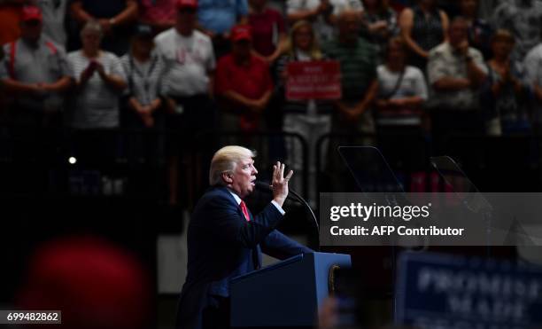 President Donald Trump speaks at a rally on June 21 in Cedar Rapids, Iowa. / AFP PHOTO / Nicholas Kamm