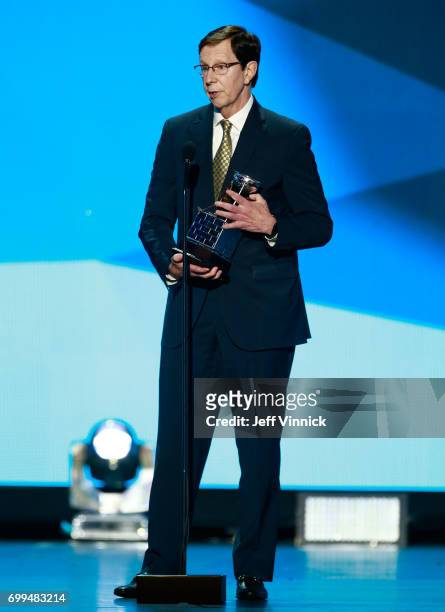 General manager David Poile speaks onstage after being awarded the NHL General Manager of the Year Award during the 2017 NHL Awards & Expansion Draft...
