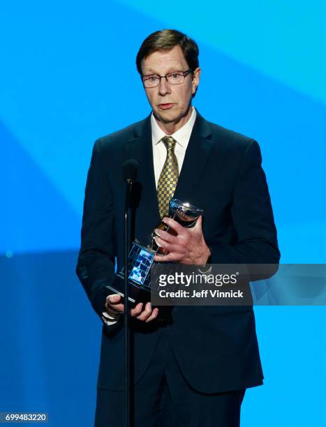 General manager David Poile speaks onstage after being awarded the NHL General Manager of the Year Award during the 2017 NHL Awards & Expansion Draft...