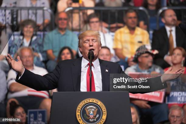 President Donald Trump speaks at a rally on June 21, 2017 in Cedar Rapids, Iowa. Trump spoke about renegotiating NAFTA and building a border wall...