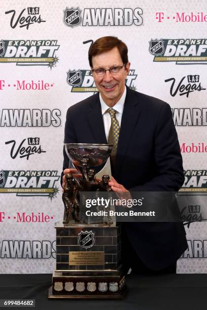 President of Hockey Operations and general manager David Poile of the Nashville Predators speaks poses after winning the NHL General Manager of the...