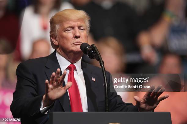 President Donald Trump speaks at a rally on June 21, 2017 in Cedar Rapids, Iowa. Trump spoke about renegotiating NAFTA and building a border wall...